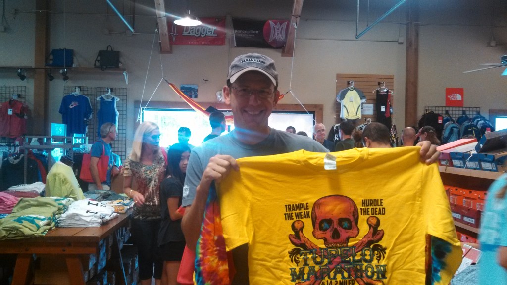 Trev at the Tupelo Marathon packet pickup.  I earned this shirt.