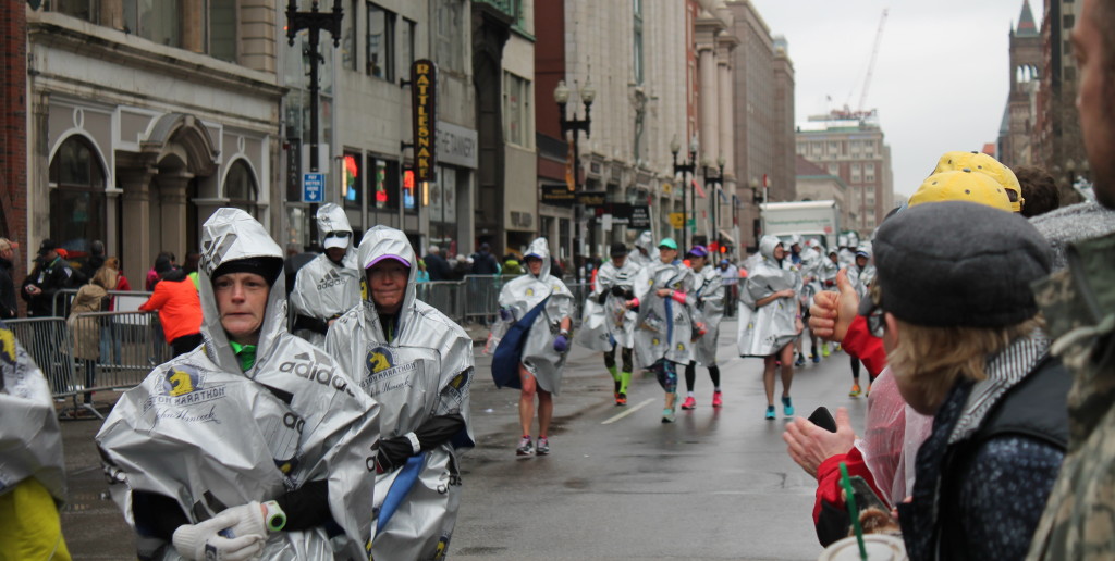 Priceless expressions from cold and weary marathon finishers.