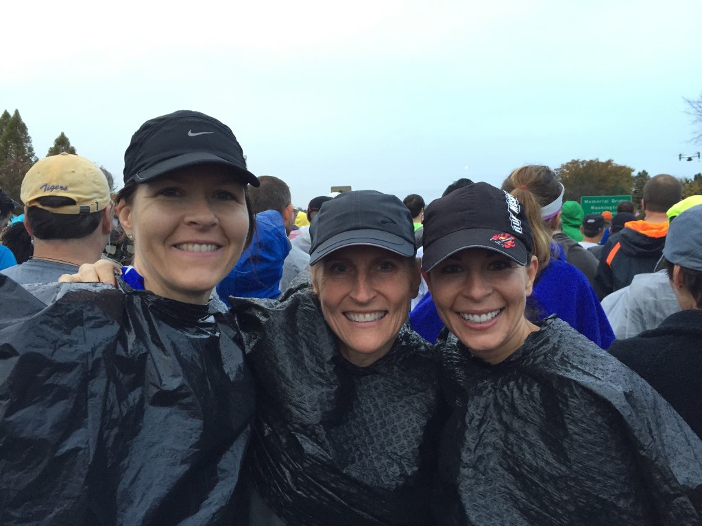 Race morning with Kristi (left) and Wendy (center).  Ready for rain!